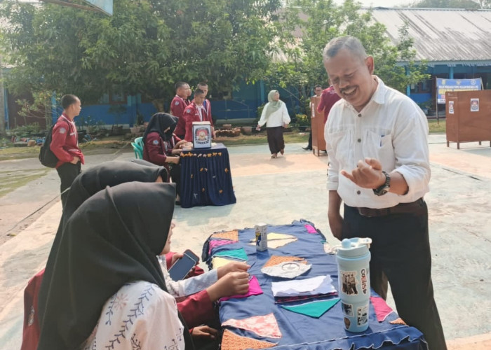 Luar Biasa! Apresiasi Pemilihan OSIS yang Tertib, Kepsek SMAN 1 Kikim Timur Beri Pesan untuk Ketua Terpilih